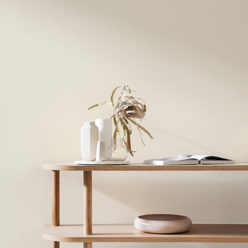 Interior room painted in Craig & Rose Chalky White with Art Deco-inspired styling