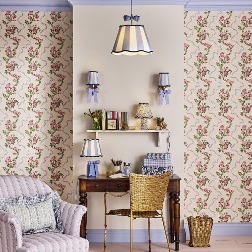 Wallpaper featuring roses and frills on a blush pink background