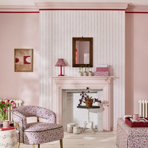 Candy stripe floral wallpaper in soft pink and red tones