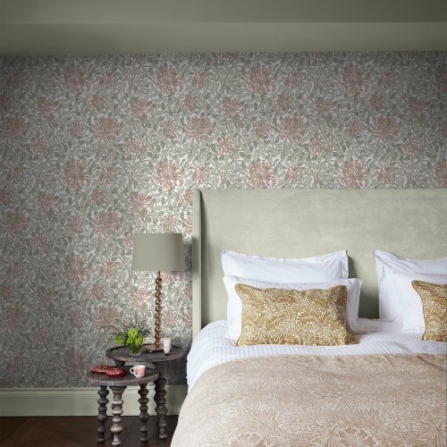 Room shot featuring Honeysuckle Verde wallpaper with rich green tones