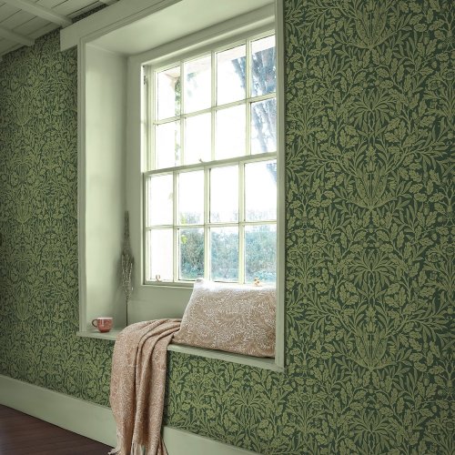 Room shot featuring Acorn Garden Green wallpaper with forest green tones