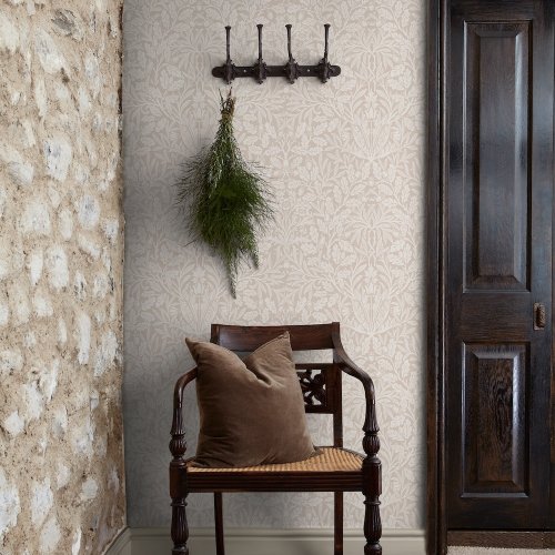 Room shot featuring Acorn Hessian wallpaper with beige background