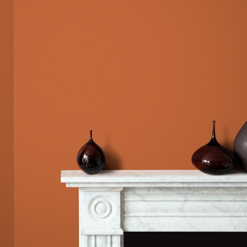 Room painted in Craig & Rose Russet with clean-lined, minimal styling