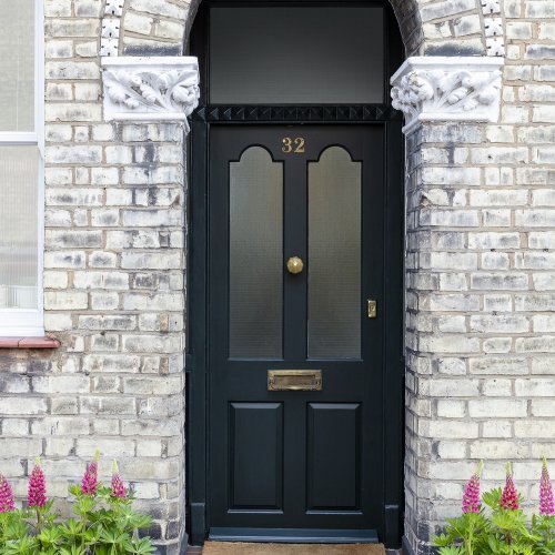 Interior room painted in Craig & Rose Jet Black with bold, sophisticated styling
