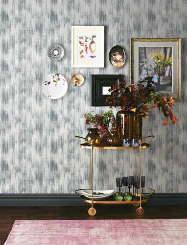 A Street Prints Marvel Blue & Grey Wallpaper styled in a modern interior, bringing subtle movement and depth to the walls
