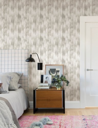 A Street Prints Marvel Stone & Grey Wallpaper styled in a modern setting, showcasing its elegant neutral tones