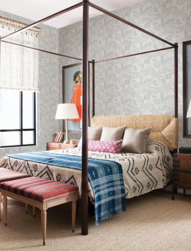 A Street Prints Jacaranda Blue Wallpaper featuring a nature-inspired pattern with tropical plants and birds.