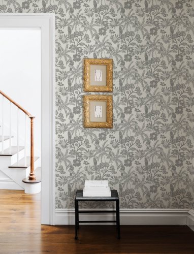 A Street Prints Jacaranda Charcoal Wallpaper close up with detailed palm leaf design and subtle toucan motifs.