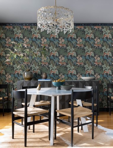 A Street Prints Caspian Blue & Grey Wallpaper featuring exotic palms, wild greenery, and tigers in a bold, adventurous design.