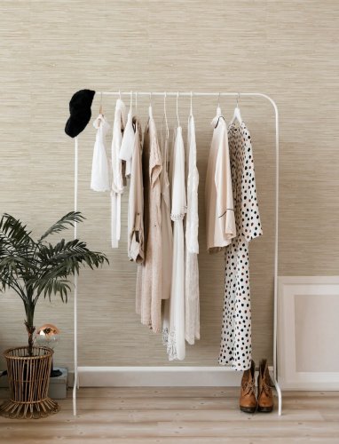 A Street Prints Exhale Cream & Stone Wallpaper with a natural, organic texture for a stylish interior.
