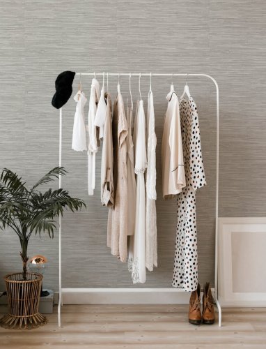 A Street Prints Exhale Grey Wallpaper featuring a neutral colour palette for a modern look.