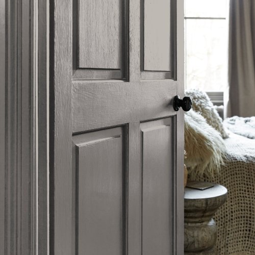 Painted door in Abigail Ahern Anise Greige with warm, neutral styling