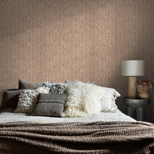 Room styled with Abigail Ahern Heirloom Knit Baked Beige wallpaper in a cosy, neutral setting