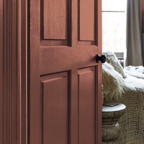 Painted door in Abigail Ahern Rocky Desert with rustic, sun-drenched styling