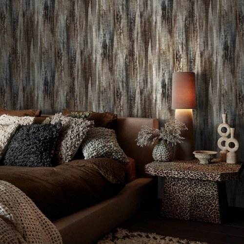 Second room view of Abigail Ahern Wanderlust Amber wallpaper with layered, ambient décor
