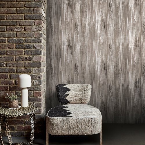 Room styled with Abigail Ahern Wanderlust Gilded wallpaper in a soft, elegant interior