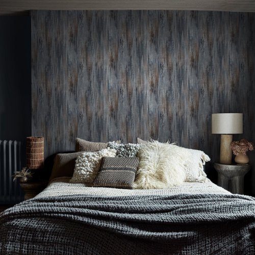 Room styled with Abigail Ahern Wanderlust Ink wallpaper in a moody, sophisticated interior