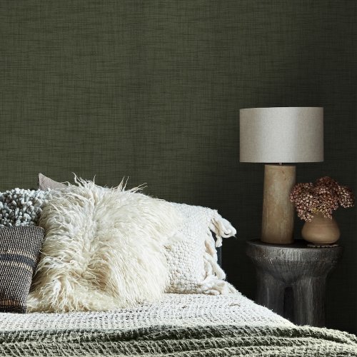 Room styled with Abigail Ahern Weathered Linen Garden wallpaper in a cosy, nature-inspired setting