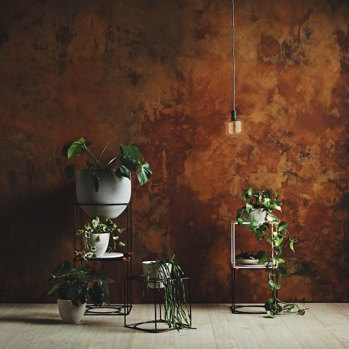 Wall with Craig & Rose Artisan Rust Effect finish in an industrial setting