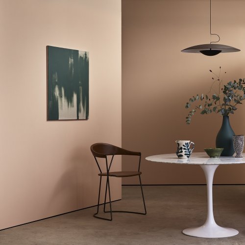 Dining room painted in Craig & Rose Châtelaine with soft, glowing tones