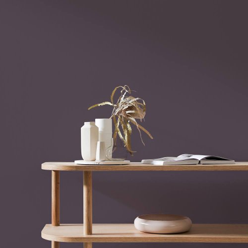 Cosy interior room painted in Craig & Rose Damson with moody, elegant styling