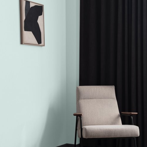 Interior room painted in Craig & Rose Porcelain Blue with classic, airy styling