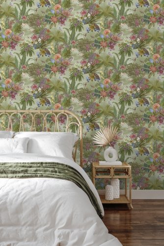 Paul Moneypenny Floral Hall wallpaper styled in a modern room with vibrant tropical print and soft green tones.