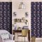Cath Kidston Rose Flutter Navy wallpaper styled wall with hand painted rose floral print