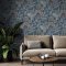 Living room styled with Superfresco Richmond Navy Wallpaper, adding depth and calm with dark blue base and botanical details.