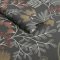 Roll of Superfresco Richmond Noir Wallpaper with charcoal background and intricate embroidered-look botanical patterns in soft colours.