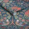Roll shot of William Morris at Home Dove & Rose Midsummer wallpaper showing intricate pattern