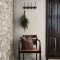 Room shot featuring Acorn Hessian wallpaper with beige background