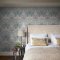 Room shot with Garden Dusty Blue wallpaper and soft-toned decor