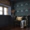 Room shot with Garden Moonlight wallpaper and rich-toned furniture
