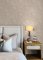 A Street Prints Vita Pink Wallpaper shown in a modern bedroom