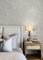 A Street Prints Vita Off White Wallpaper featured on room wall