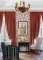 Cecilia Red botanical wallpaper shown in a modern interior