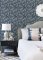 Maeve Midnight Blue wallpaper bringing folk floral charm to a room