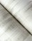 A roll of A Street Prints Marvel Stone & Grey Wallpaper displaying its modern blurred effect in stone and grey shades