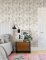 A Street Prints Marvel Stone & Grey Wallpaper styled in a modern setting, showcasing its elegant neutral tones