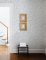 A Street Prints Jacaranda Blue Wallpaper with a textured background and botanical design, ideal for feature walls.