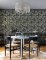 A Street Prints Caspian Charcoal Wallpaper with exotic tigers and rich botanical elements creating a bold and dramatic statement.