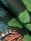 A Street Prints Caspian Green Wallpaper highlighting jungle leaves and detailed tiger illustrations.