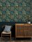 A Street Prints Caspian Green Wallpaper showcasing exotic wildlife and lush greenery for a jungle-inspired interior.