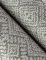 A Street Prints Gallivant Grey Wallpaper highlighting its intricate fabric-inspired detailing.