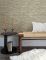 A Street Prints Exhale Natural & Green Wallpaper with a subtle texture, perfect for adding depth to any space.