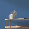 Interior room painted in Craig & Rose Flanders Blue with relaxed, classic styling