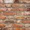 Grandeco Rustic Brick Rust Wallpaper with realistic brick design