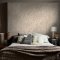 Second room view of Abigail Ahern Boheme Marble Almond wallpaper with warm, layered décor