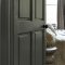 Painted door in Abigail Ahern Desert Saltbush with earthy, layered styling